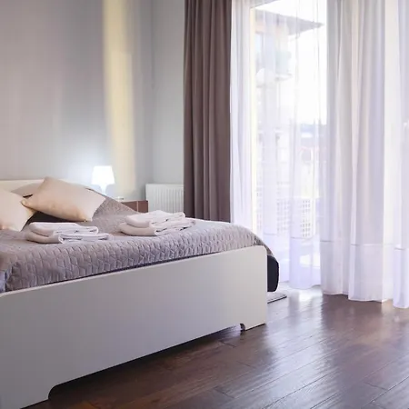 Osiedle Na Chelmonskiego - Parking - Apartamenty Bryza Daire *