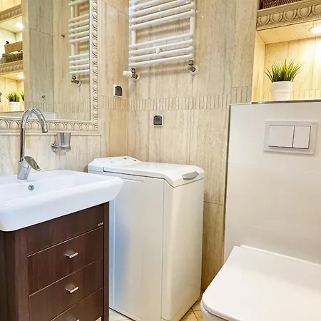 Osiedle Na Chelmonskiego - Parking - Apartamenty Bryza Daire *